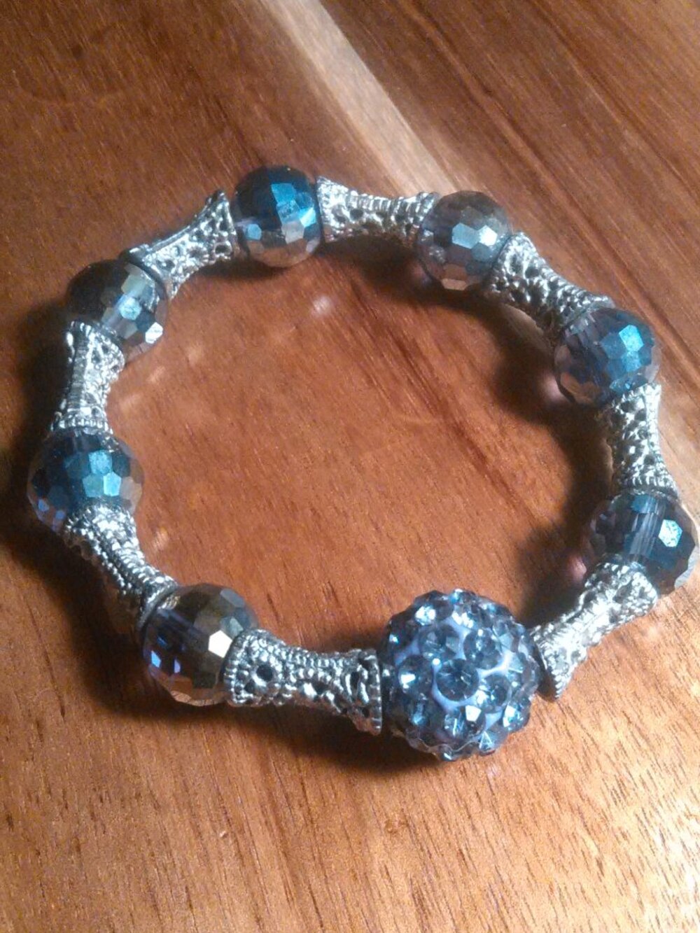 Purple Crystal and Beveled Bead Silvertone Stretch Bracelet